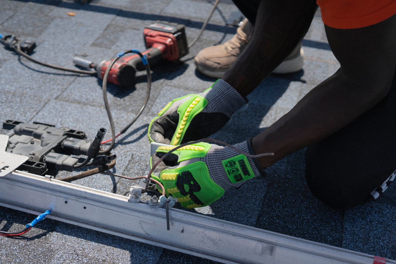 A GreenLeaf crew installing modules on a Boulder County roof